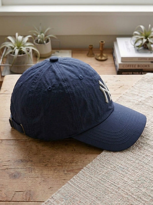 The Coastal Navy Ball Cap parachute